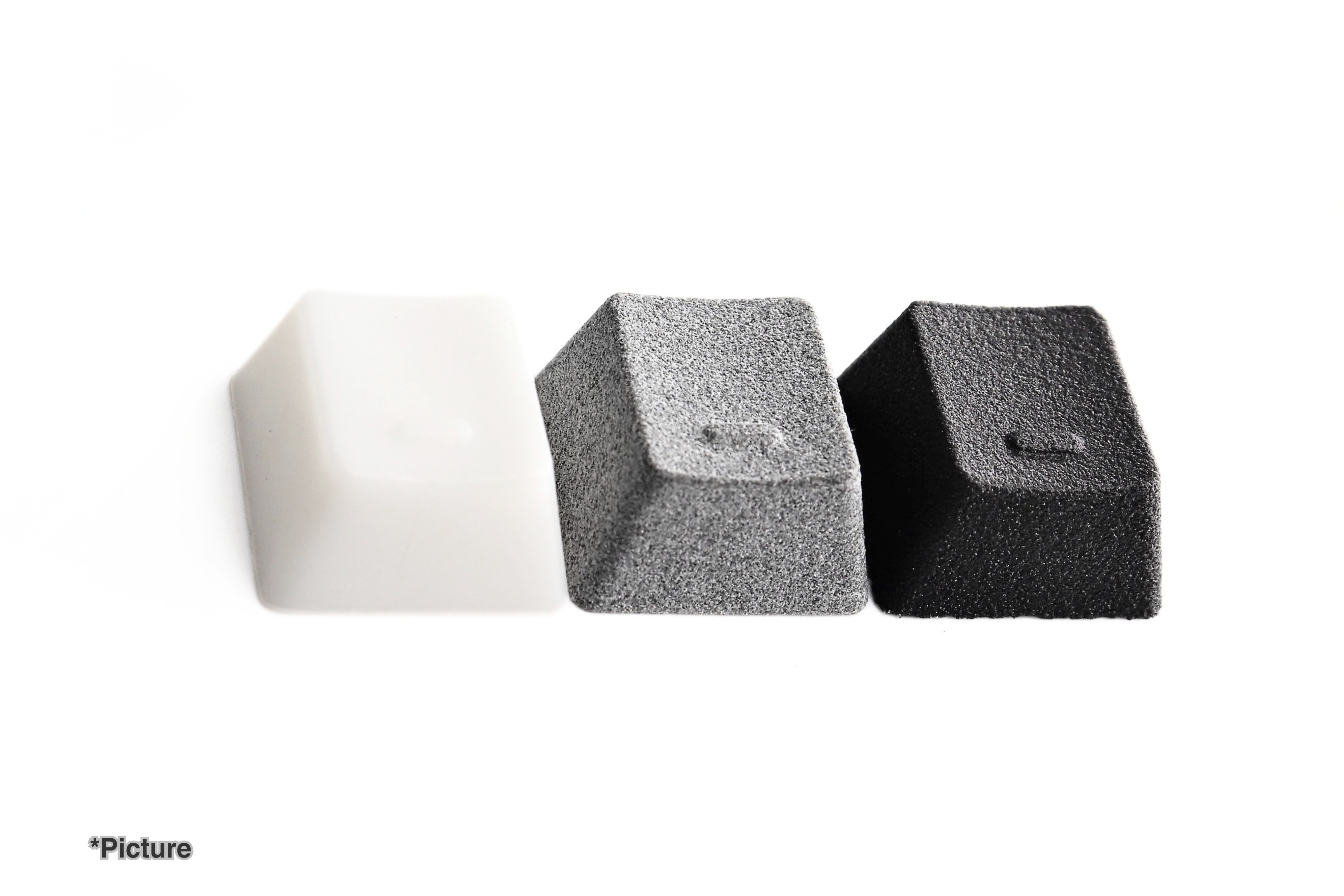 OEM Homing Keycaps Shown in Resin and Nylon Options