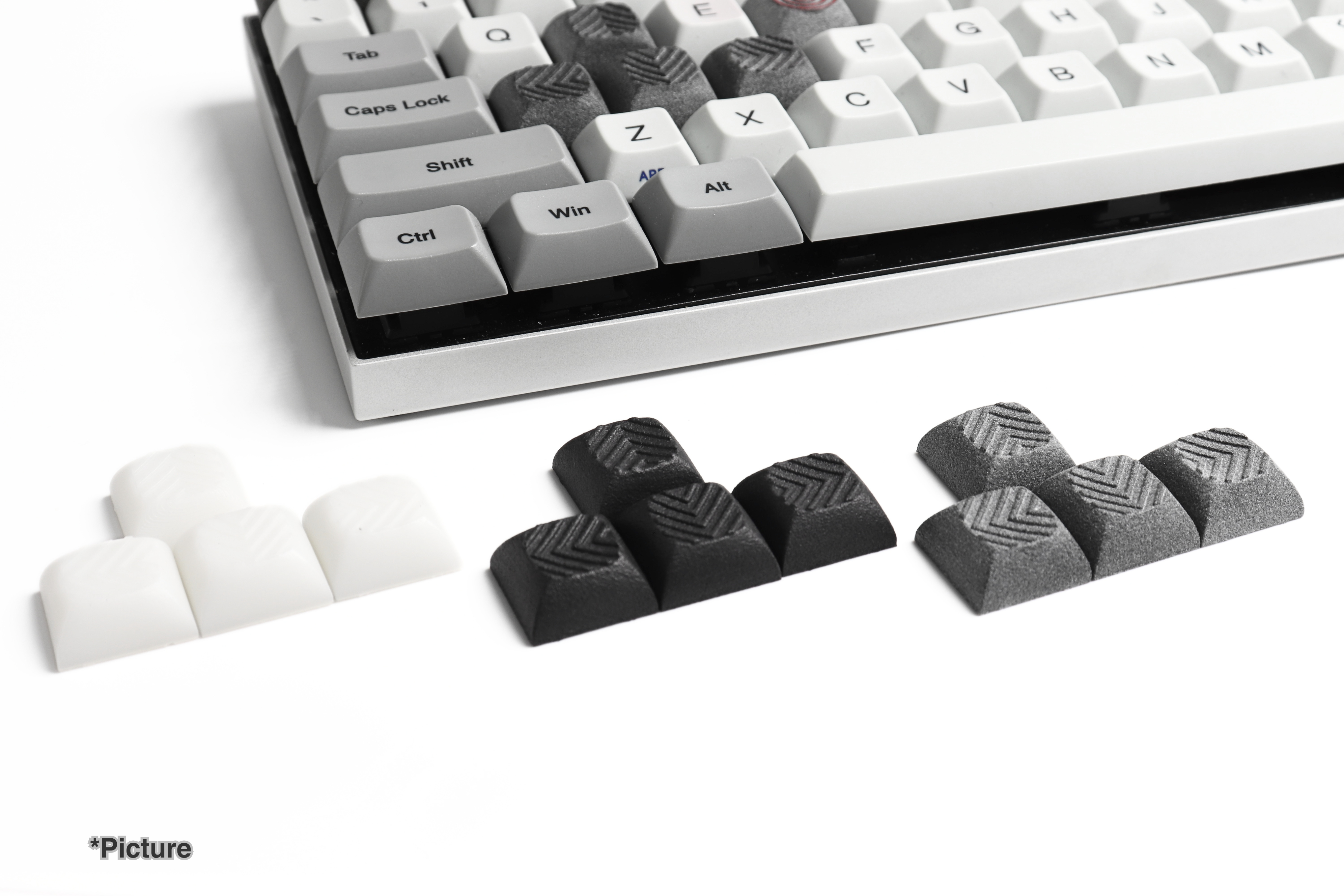 DSA Arrow Keycaps Shown in Different Variations
