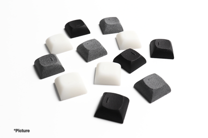 DSA Homing Keycaps Shown in Resin and Nylon Materials