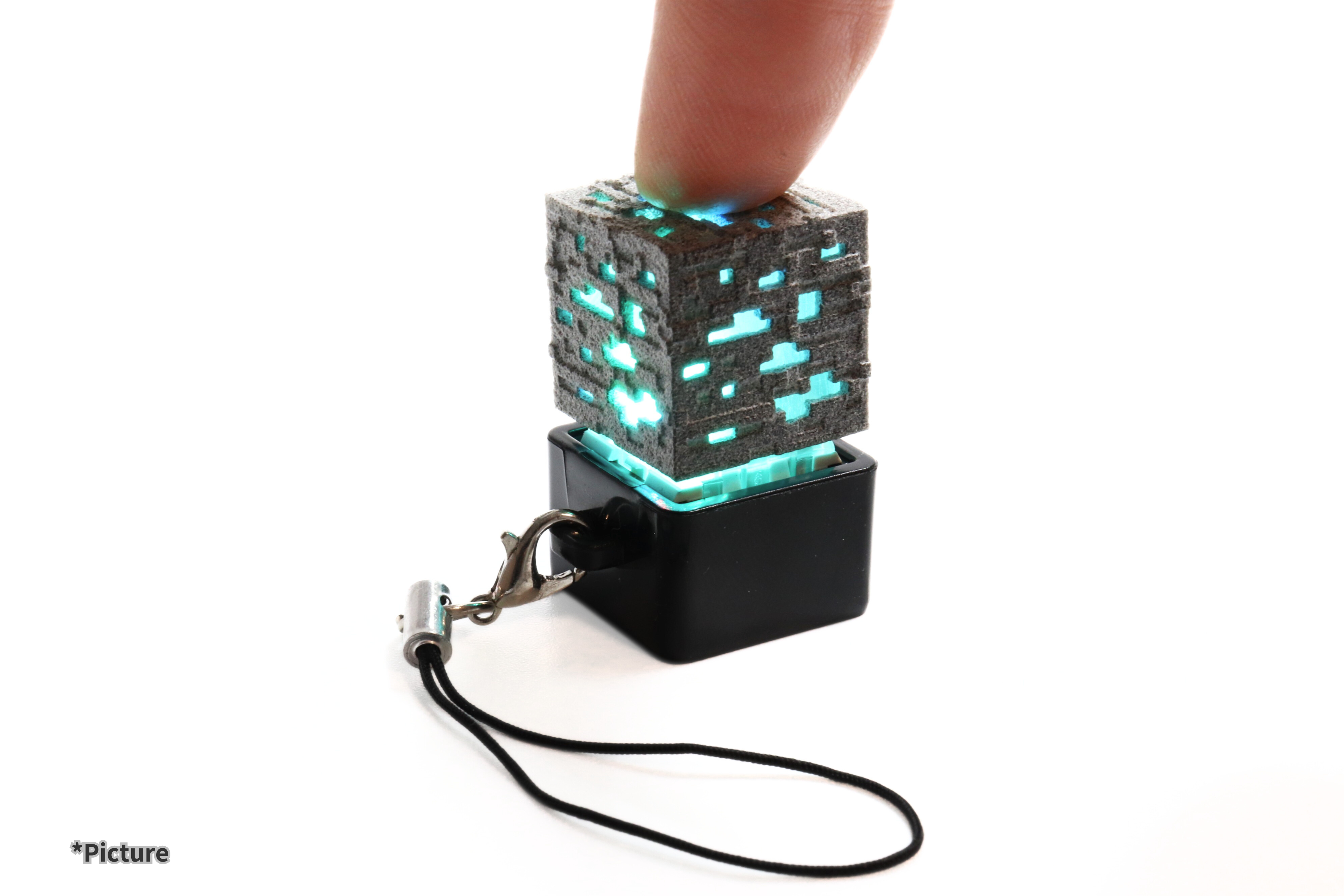 Finger pressing minecraft ore keychain keycap