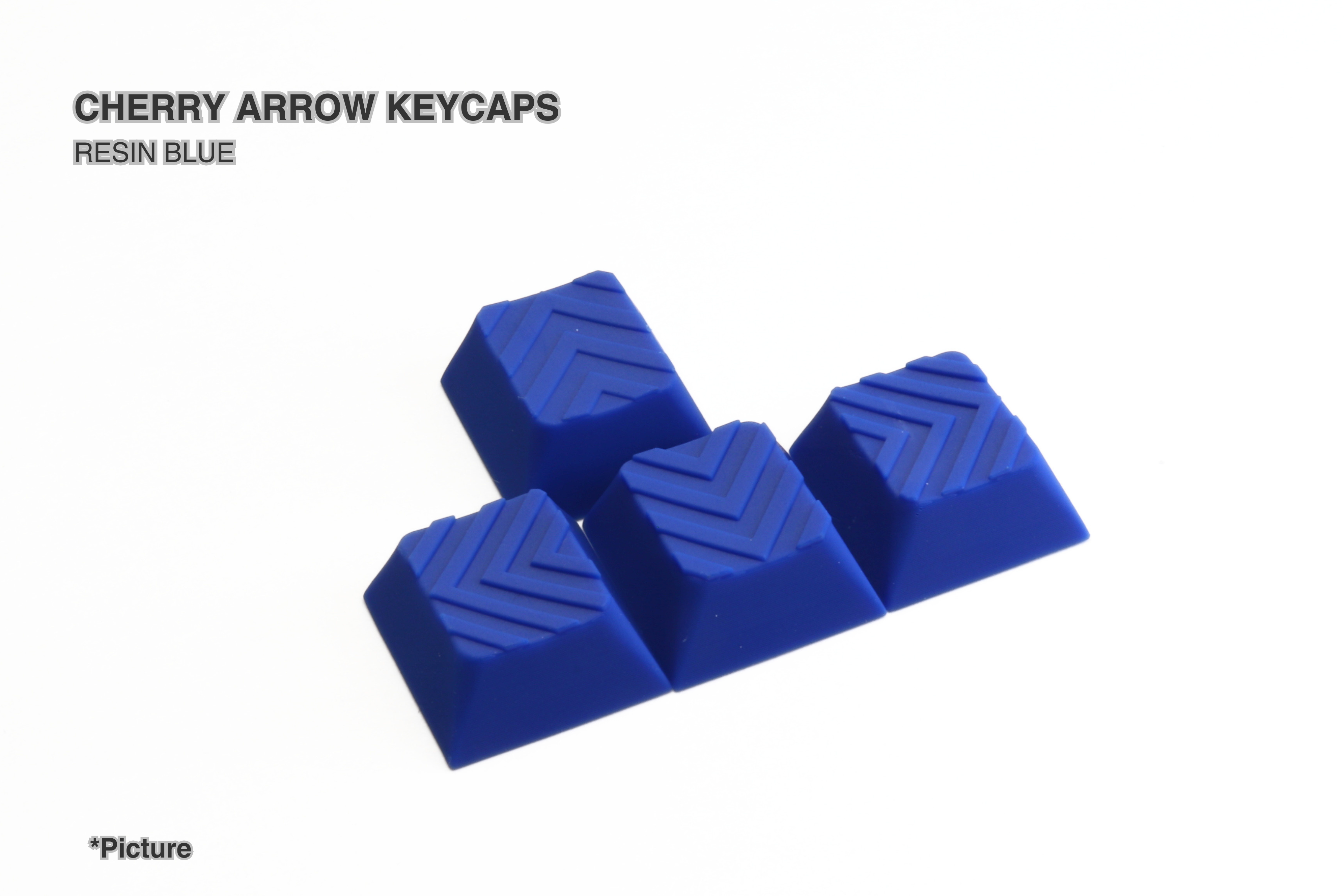 Cherry Arrow Keycap Set Shown in Resin Blue