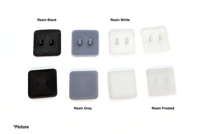 SCS Keycaps Shown in Resin Black, White, Grey, and Frosted
