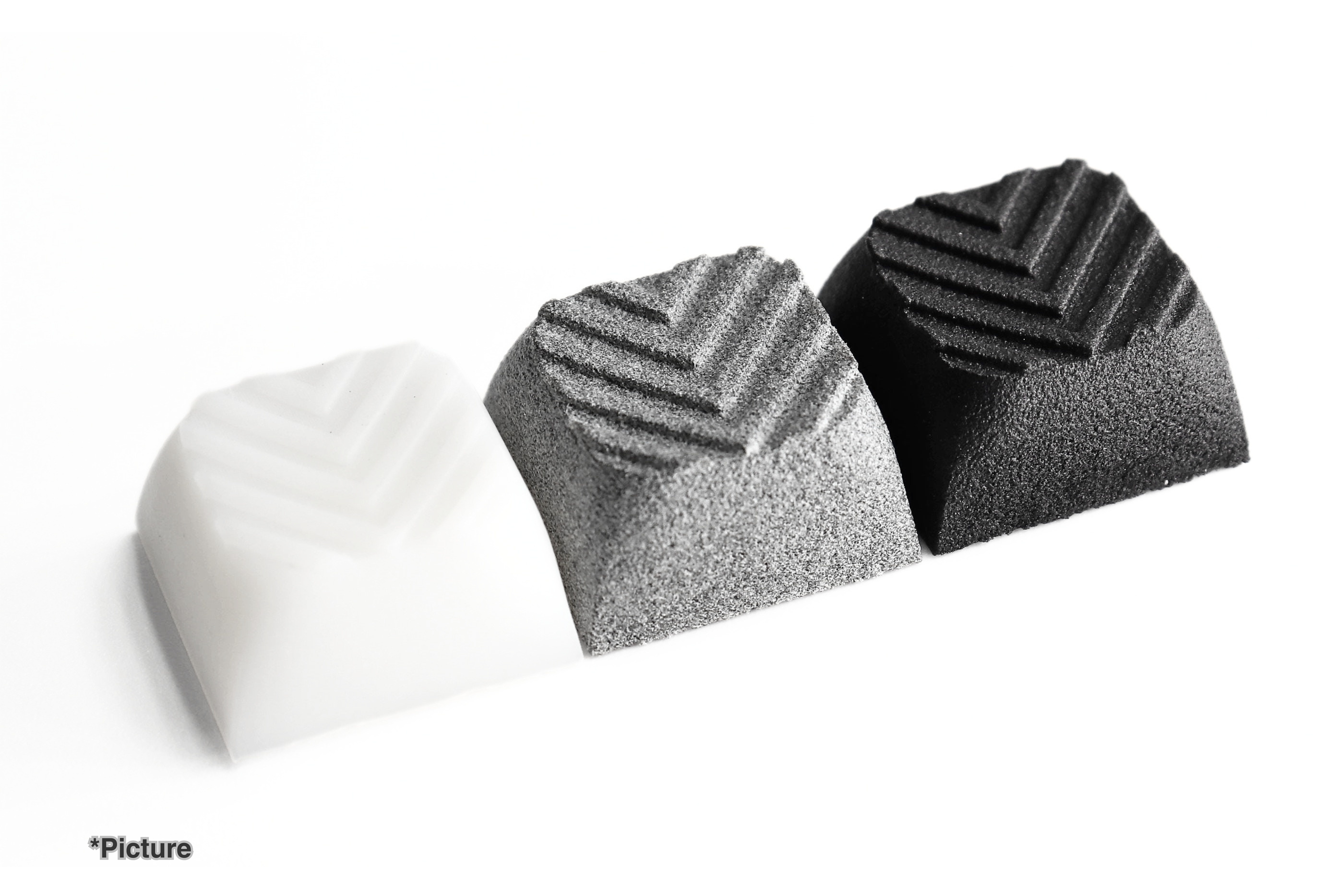 XDA Arrow Keycaps Shown in Different Material Options
