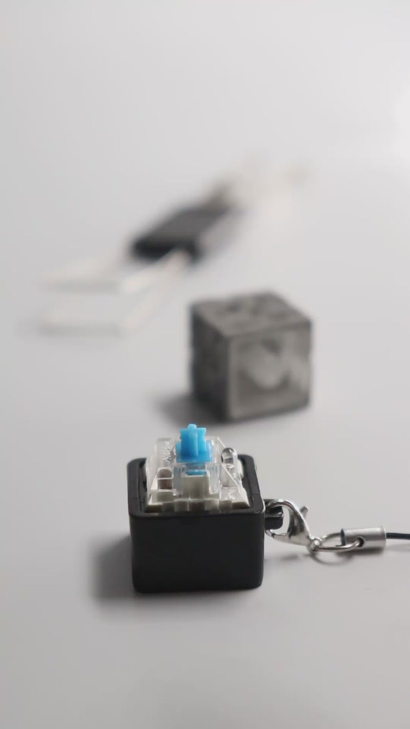 Video of minecraft ore keychain keycap in use